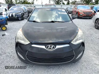 2013 Hyundai Veloster w/Black Int z VIN KMHTC6ADXDU157196, wystawiony jako Copart lot #58091015 z przebiegiem 136 201 mil mil oraz Szkoda całkowita • Salvage title. Historia ofert i sprzedaży dostępna na DreamBid. Obrazek 5.