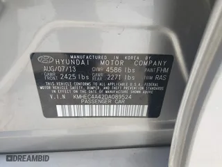 2013 Hyundai Sonata Hybrid with VIN KMHEC4A42DA089524, listed as a IAAI auction lot 41233221 with 114,636 mi miles. Bid and sale history available at carsss.com. Image 9.