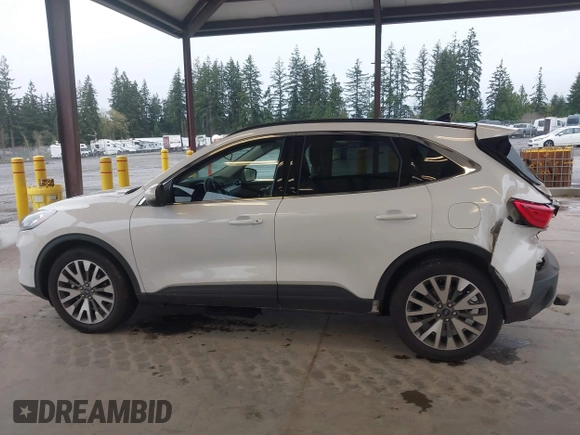 2020 Ford Escape Titanium Hybrid z VIN 1FMCU9DZ8LUA58350, wystawiony jako IAAI lot #41975564 z przebiegiem 38 387 mil mil oraz . Historia ofert i sprzedaży dostępna na DreamBid. Obrazek 14.