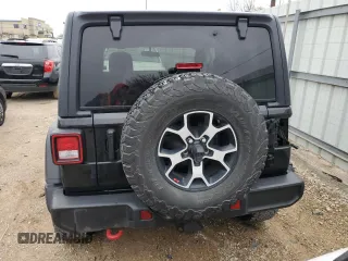 2021 Jeep Wrangler Rubicon z VIN 1C4HJXCG2MW665809, wystawiony jako Copart lot #84007354 z przebiegiem Nie podano mil oraz Szkoda całkowita • Salvage title. Historia ofert i sprzedaży dostępna na DreamBid. Obrazek 6.
