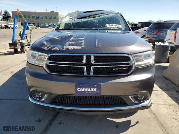 2014 Dodge Durango Limited with VIN 1C4SDJDT9EC394501, listed as a Copart auction lot 58161754 with 86,066 mi miles and Clean Title. Bid and sale history available at carsss.com. Image 5.