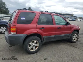 2005 Ford Escape XLT with VIN 1FMYU93105KD73059, listed as a Copart auction lot 53149615 with 143,739 mi miles and Salvage Title. Bid and sale history available at carsss.com. Image 3.
