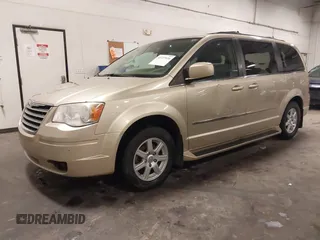 2010 Chrysler Town & Country Touring with VIN 2A4RR5D17AR184092, listed as a IAAI auction lot 41727926 with 158,937 mi miles and . Bid and sale history available at DreamBid. Image 2.