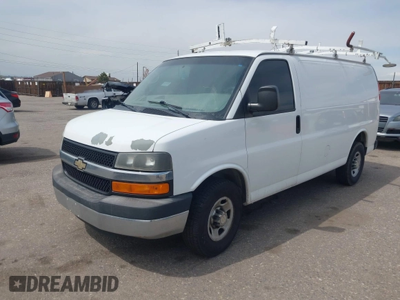 2012 Chevrolet Express Cargo Van with VIN 1GCWGFCA7C1121989, listed as a IAAI auction lot 42118853 with 214,478 mi miles. Bid and sale history available at carsss.com. Image 17.
