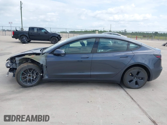 2023 Tesla Model 3 with VIN 5YJ3E1EA7PF417293, listed as a IAAI auction lot 42407659 with 22,578 mi miles and . Bid and sale history available at DreamBid. Image 14.