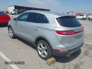 2015 Lincoln MKC with VIN 5LMCJ2A94FUJ16038, listed as a IAAI auction lot 42057400 with 102,848 mi miles. Bid and sale history available at carsss.com. Image 3.