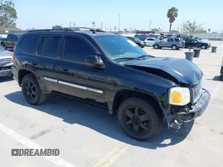 2004 GMC Envoy SLT with VIN 1GKDS13S842428797, listed as a IAAI auction lot 42503987 with 175,228 mi miles and . Bid and sale history available at DreamBid. Image 1.