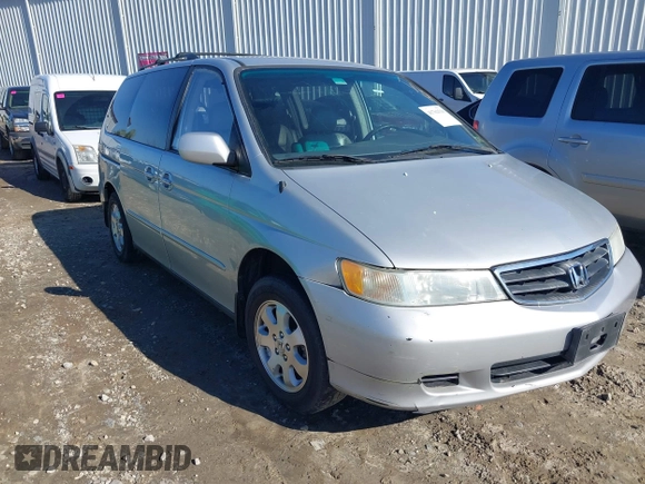 2004 Honda Odyssey EX-L with VIN 5FNRL18974B057715, listed as a IAAI auction lot 41762518 with 193,626 mi miles and . Bid and sale history available at DreamBid. Image 6.