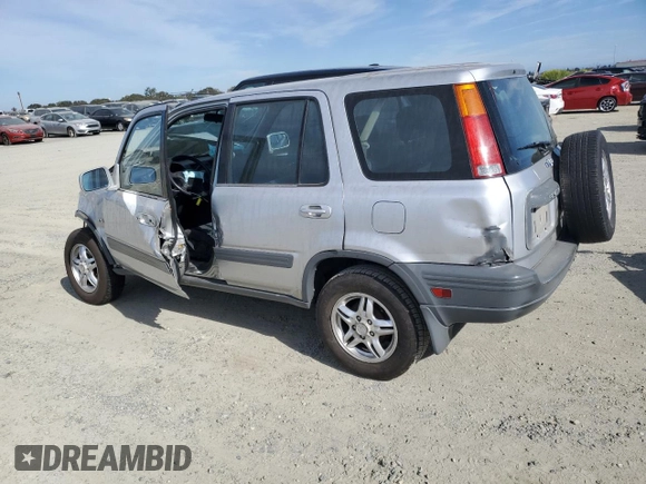 2000 Honda CR-V EX with VIN JHLRD1863YC002722, listed as a Copart auction lot 77416684 with 260,216 mi miles and Salvage Title. Bid and sale history available at carsss.com. Image 2.