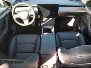 2024 Tesla Model Y with VIN 7SAYGDED7RF108604, listed as a Copart auction lot 48384825 with 24,603 mi miles and Salvage Title. Bid and sale history available at DreamBid. Image 8.