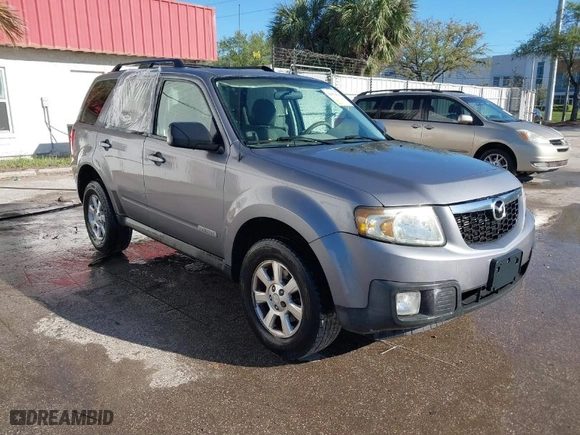 2008 Mazda Tribute Grand Touring with VIN 4F2CZ02Z78KM12026, listed as a IAAI auction lot 41671615 with 204,422 mi miles. Bid and sale history available at carsss.com. Image 1.