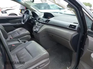 2012 Honda Odyssey Touring with VIN 5FNRL5H91CB121950, listed as a IAAI auction lot 42456620 with 200,831 mi miles and . Bid and sale history available at DreamBid. Image 5.