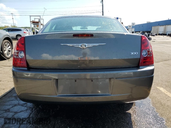 2009 Chrysler 300 LX with VIN 2C3KA43DX9H517198, listed as a Copart auction lot 71827414 with 81,888 mi miles and Clean Title. Bid and sale history available at carsss.com. Image 6.