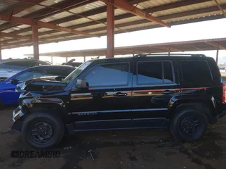 2014 Jeep Patriot Sport with VIN 1C4NJPBB7ED915924, listed as a IAAI auction lot 41641555 with 131,732 mi miles. Bid and sale history available at carsss.com. Image 14.