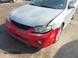 2003 Mazda Protege with VIN JM1BJ245031218333, listed as a IAAI auction lot 42070471 with 181,748 mi miles and . Bid and sale history available at DreamBid. Image 6.
