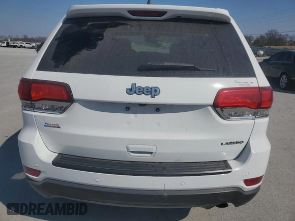 2020 Jeep Grand Cherokee Laredo E с VIN 1C4RJEAGXLC219841, выставлен на аукционе Copart как лот 48617635 с пробегом 35 325 миль миль и Списание • Salvage title. История ставок и продаж доступна на DreamBid. Изображение 6.