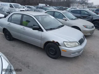 2002 Mitsubishi Lancer ES with VIN JA3AJ26E62U060214, listed as a IAAI auction lot 40961872 with 150,399 mi miles. Bid and sale history available at carsss.com. Image 1.