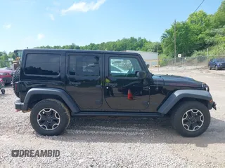 2017 Jeep Wrangler Unlimited Rubicon Recon z VIN 1C4HJWFG4HL507601, wystawiony jako IAAI lot #42258921 z przebiegiem 106 122 mil mil oraz . Historia ofert i sprzedaży dostępna na DreamBid. Obrazek 14.