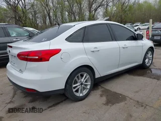 2016 Ford Focus SE with VIN 1FADP3F2XGL324613, listed as a IAAI auction lot 41971597 with 126,738 mi miles. Bid and sale history available at carsss.com. Image 4.