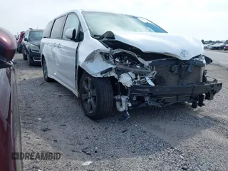 2015 Toyota Sienna SE with VIN 5TDXK3DC4FS566084, listed as a IAAI auction lot 41777561 with 153,002 mi miles. Bid and sale history available at carsss.com. Image 1.