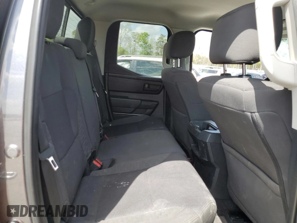 2022 Toyota Tundra SR z VIN 5TFKB5DA7NX047592, wystawiony jako Copart lot #51610295 z przebiegiem 50 737 mil mil oraz Szkoda całkowita • Salvage title. Historia ofert i sprzedaży dostępna na DreamBid. Obrazek 10.
