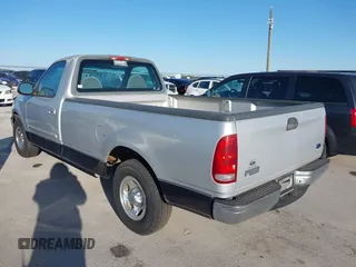 1999 Ford F-150 with VIN 1FTZF1727XKA60617, listed as a IAAI auction lot 41980403 with 98,481 mi miles and . Bid and sale history available at DreamBid. Image 3.