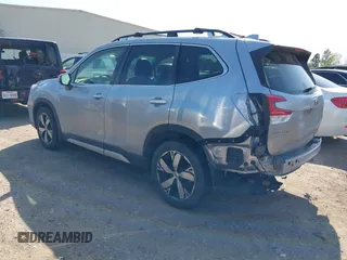 2020 Subaru Forester Touring with VIN JF2SKAXC5LH443602, listed as a IAAI auction lot 41868286 with 101,156 mi miles. Bid and sale history available at carsss.com. Image 3.