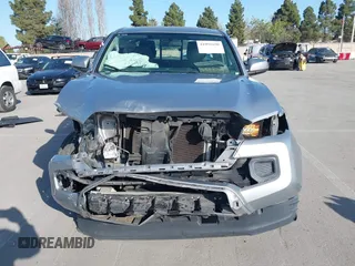 2017 Toyota Tacoma SR with VIN 5TFSX5EN9HX054583, listed as a IAAI auction lot 41991690 with 129,524 mi miles and . Bid and sale history available at DreamBid. Image 12.