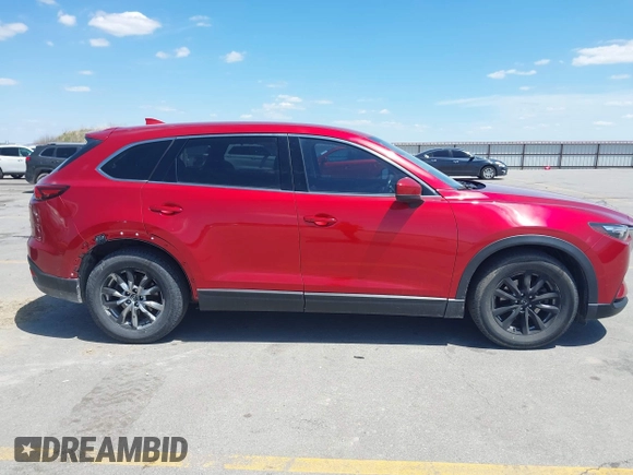 2016 Mazda CX-9 Touring with VIN JM3TCBCY5G0104504, listed as a IAAI auction lot 42314649 with 116,536 mi miles and . Bid and sale history available at DreamBid. Image 13.