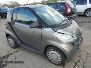 2013 Smart fortwo Pure with VIN WMEEJ3BA6DK653471, listed as a Copart auction lot 51864365 with 129,778 mi miles and Clean Title. Bid and sale history available at DreamBid. Image 4.