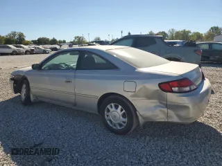 1999 Toyota Solara SE with VIN 2T1CG22P9XC236340, listed as a Copart auction lot 75383194 with 105,908 mi miles and Salvage Title. Bid and sale history available at DreamBid. Image 2.