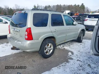 2006 Mazda Tribute LX with VIN 4F2YZ94126KM09467, listed as a IAAI auction lot 41324941 with 116,519 mi miles and . Bid and sale history available at DreamBid. Image 4.