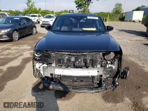 2022 Mazda MX-30 Premium Plus z VIN JM1DRADB6N0101074, wystawiony jako Copart lot #68379044 z przebiegiem 43 559 mil mil oraz Szkody całkowita. Historia ofert i sprzedaży dostępna na DreamBid. Obrazek 5.