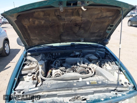 1996 Oldsmobile Bravada z VIN 1GHDT13W5T2711291, wystawiony jako IAAI lot #42502672 z przebiegiem 219 062 mil mil oraz . Historia ofert i sprzedaży dostępna na DreamBid. Obrazek 10.