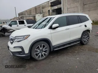 2019 Honda Pilot Touring 7-Passenger z VIN 5FNYF5H61KB008717, wystawiony jako Copart lot #53581624 z przebiegiem 40 024 mil mil oraz Szkoda całkowita • Salvage title. Historia ofert i sprzedaży dostępna na DreamBid. Obrazek 1.