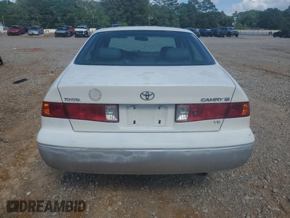 2001 Toyota Camry LE z VIN JT2BF22K310305858, wystawiony jako Copart lot #55231305 z przebiegiem 149 104 mil mil oraz Nie do naprawy • Non repairable. Historia ofert i sprzedaży dostępna na DreamBid. Obrazek 6.