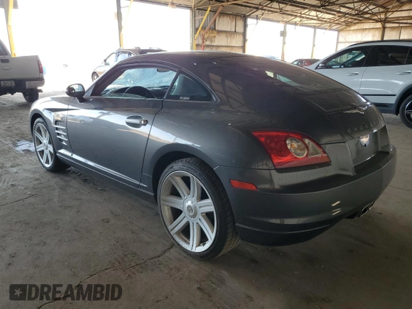 2005 Chrysler Crossfire Limited z VIN 1C3AN69L75X035501, wystawiony jako Copart lot #52450755 z przebiegiem 71 051 mil mil oraz Tytuł czysty. Historia ofert i sprzedaży dostępna na DreamBid. Obrazek 2.