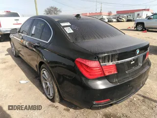 2011 BMW 7 Series 740i with VIN WBAKA4C55BC612634, listed as a IAAI auction lot 35404385 with 156,003 mi miles. Bid and sale history available at carsss.com. Image 3.