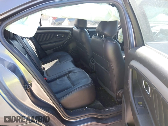2014 Ford Taurus SEL with VIN 1FAHP2E82EG162676, listed as a IAAI auction lot 41795220 with 125,491 mi miles. Bid and sale history available at carsss.com. Image 8.