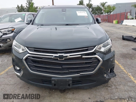 2020 Chevrolet Traverse LT Cloth with VIN 1GNERGKWXLJ320261, listed as a IAAI auction lot 42094336 with 51,063 mi miles. Bid and sale history available at carsss.com. Image 6.