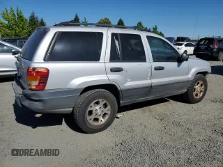 2004 Jeep Grand Cherokee Laredo with VIN 1J4GW48S54C103651, listed as a Copart auction lot 62972615 with 188,000 mi miles and Clean title. Bid and sale history available at DreamBid. Image 3.