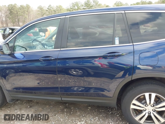 2018 Honda Pilot EX-L with VIN 5FNYF5H5XJB025960, listed as a IAAI auction lot 41843520 with 23,404 mi miles and . Bid and sale history available at DreamBid. Image 14.