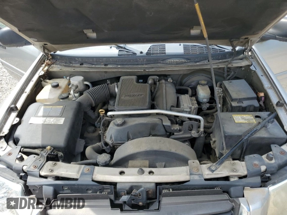 2004 GMC Envoy SLE with VIN 1GKDS13S942119615, listed as a Copart auction lot 69653494 with 141,856 mi miles and Salvage Title. Bid and sale history available at carsss.com. Image 12.