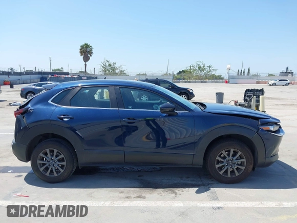 2021 Mazda CX-30 S with VIN 3MVDMAAL1MM270540, listed as a IAAI auction lot 42521513 with 63,993 mi miles and . Bid and sale history available at DreamBid. Image 14.