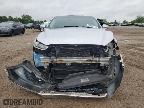 2013 Ford Fusion SE Hybrid с VIN 3FA6P0LU9DR233472, выставлен на аукционе Copart как лот 57994345 с пробегом 194 862 миль миль и Списание • Salvage title. История ставок и продаж доступна на DreamBid. Изображение 5.