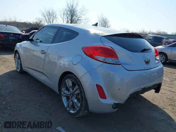 2012 Hyundai Veloster w/Black Int with VIN KMHTC6AD7CU063968, listed as a IAAI auction lot 41764263 with 83,634 mi miles and . Bid and sale history available at DreamBid. Image 3.