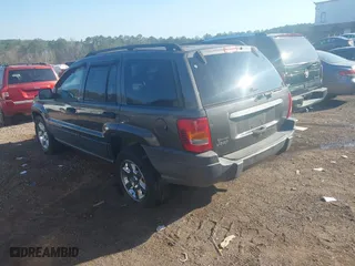 2004 Jeep Grand Cherokee Laredo with VIN 1J4GX48S44C394429, listed as a IAAI auction lot 41802203 with 144,925 mi miles. Bid and sale history available at carsss.com. Image 3.