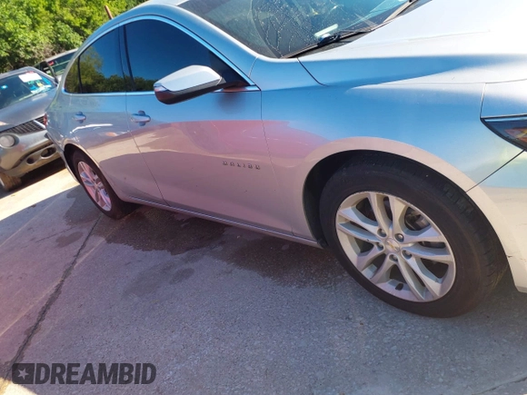 2018 Chevrolet Malibu LT z VIN 1G1ZD5ST4JF244922, wystawiony jako IAAI lot #42218808 z przebiegiem 119 042 mil mil oraz . Historia ofert i sprzedaży dostępna na DreamBid. Obrazek 13.