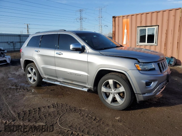 2015 Jeep Grand Cherokee Overland with VIN 1C4RJFCT8FC619014, listed as a Copart auction lot 44304375 with 123,767 mi miles and Salvage Title. Bid and sale history available at carsss.com. Image 4.