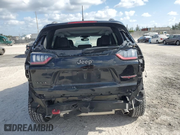 2019 Jeep Cherokee Trailhawk с VIN 1C4PJMBXXKD342371, выставлен на аукционе Copart как лот 55144715 с пробегом 78 433 миль миль и Списание • Salvage title. История ставок и продаж доступна на DreamBid. Изображение 6.